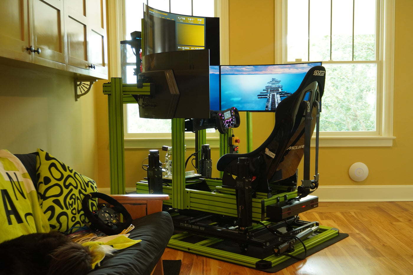 Professional technicians installing racing simulator