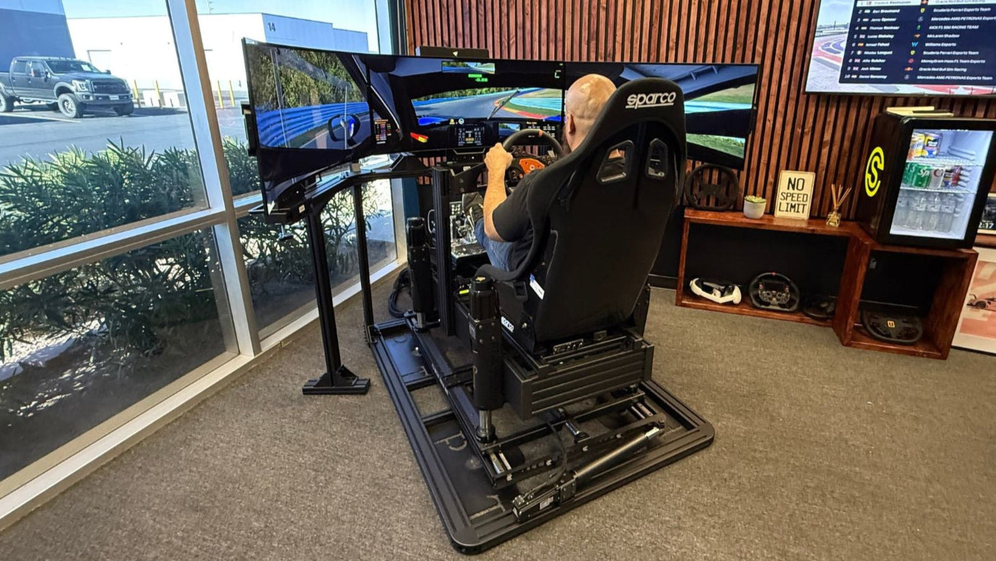 Full motion racing simulator showcasing professional motion platform quality