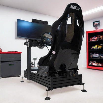Widescreen racing simulator in garage