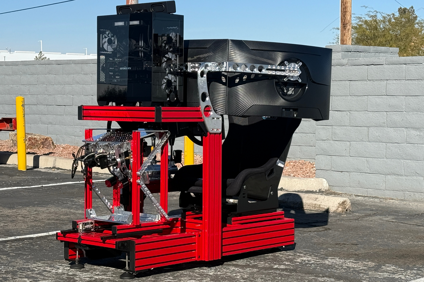 Professional technicians installing Pro racing simulator