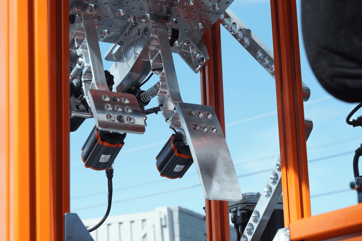 Hydraulic sim racing pedals by Sim Coaches featuring realistic brake clutch and throttle with professional grade hydraulic cylinders